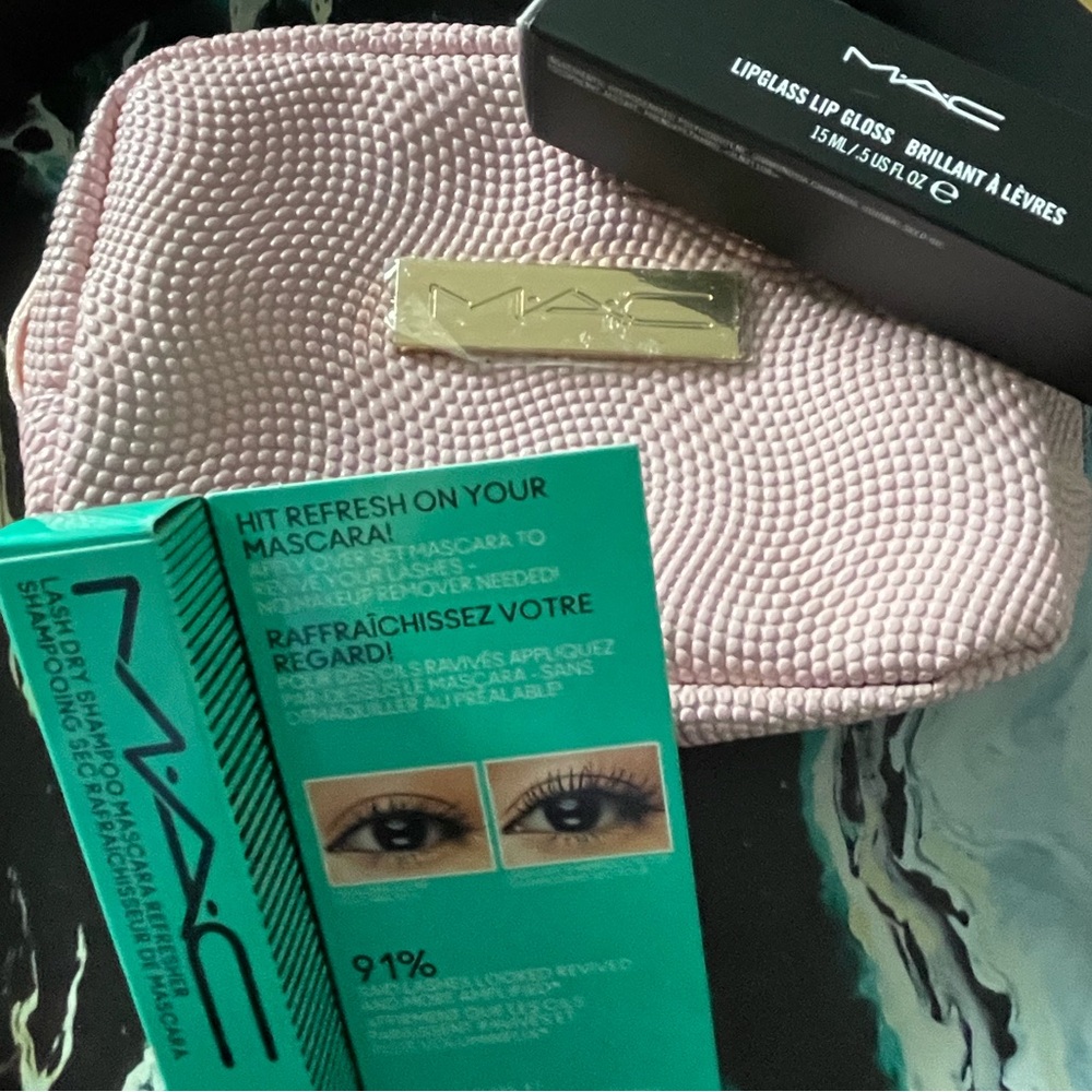 NWT MAC bundle includes Lash Dry, Lip Glass , Makeup bag